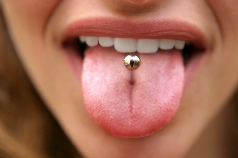 tongue piercing oral health simplyfloss